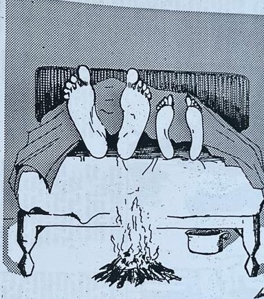 Cartoon accompanying the column: Four bare feet standing out of the bedclothes at the foot of a bed, and a camp fire built between them with a pot slung over the flames.
