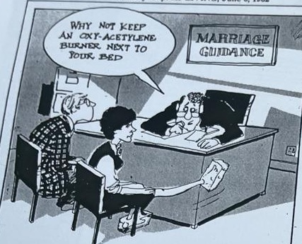 Cartoon accompanying the column: WHY NOT KEEP AN OXY-ACETYLENE BURNER NEXT TO YOUR BED, offered across the desk of an office marked MARRIAGE GUIDANCE.