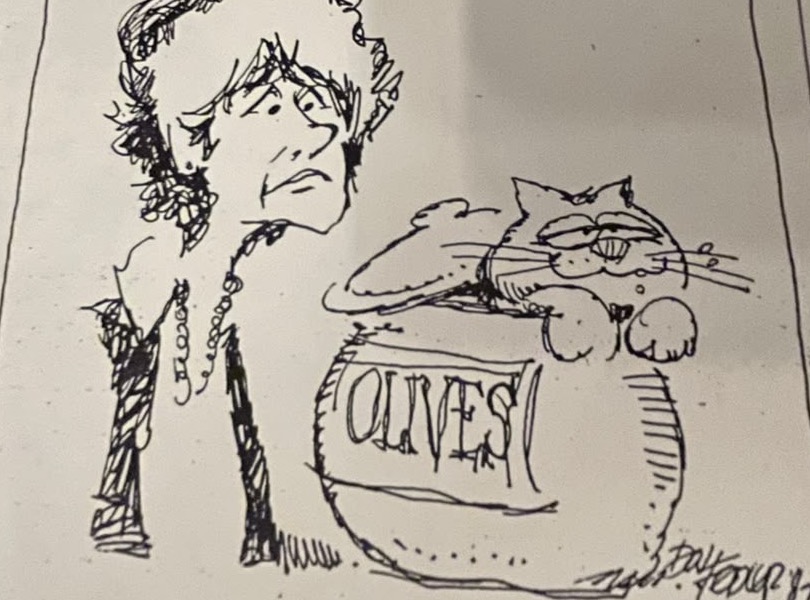Cartoon accompanying the column: Motorcat draped over the olive jar with his eyes shut and his whiskers out, Carol looking on and saying nothing.